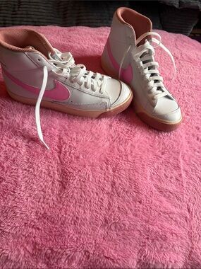 Nike Women’s White High-Top Sneakers with Pink Swoosh